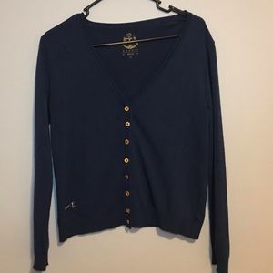 A navy blue cardigan with buttons